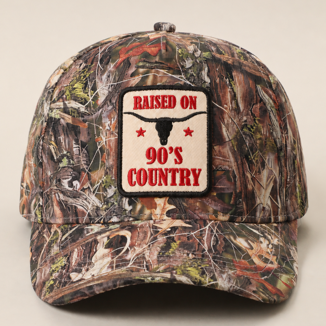 RAISED ON 90'S COUNTRY Embroidered Camo Trucker Hat: TAN-CAMO / ONE SIZE