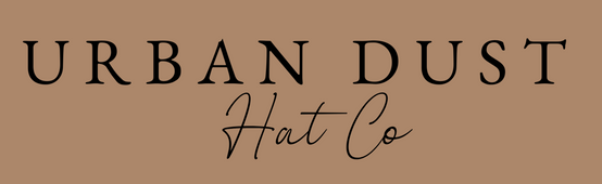 A solid brown background with the text 'URBAN DUST Hat Co' in black, centered on the canvas.